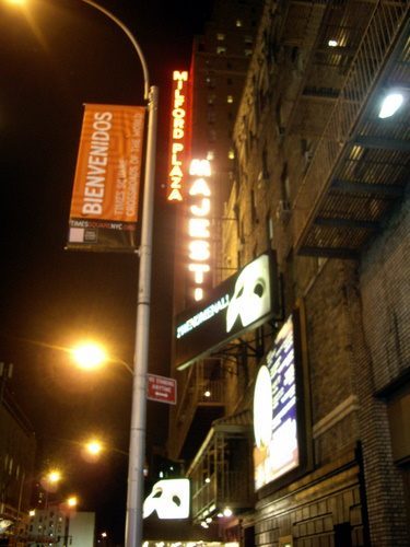 Looking up at the signage of the Phantom mask, outside the Majestic Theatre on 245 West 44th Street, New York.