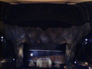 The stage at the very beginning (prologue/auction scene).