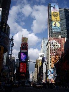 The famous Times Square skyline, with musicals splashed all over prominent billboards and constant ads flickering over the massive outdoor screens.