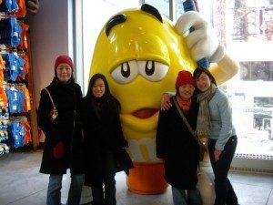 ...and finally a rather more friendly looking Yellow who obliged us with a photo, being the only M&M actually situated on the ground. L-R: Amanda, me, Yellow, Dewi and Kat.